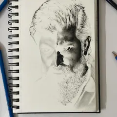 Here, I am in the middle of sketching another legend of Indian cinema. This work in progress shows the careful shading required to build the inverted features, a testament to the patience needed to honor these powerful figures through my art.
