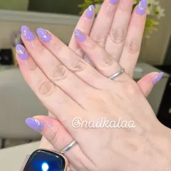 A beautiful pastel lavender manicure with delicate silver line art and a single rhinestone accent. This design is soft, feminine, and elegant.