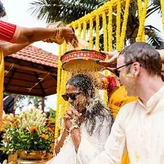 The 'talambralu' ritual during this South Indian Haldi was a highlight. The couple joyfully showered each other with rice, turmeric, and flower petals, surrounded by their closest family in a fun and meaningful ceremony.