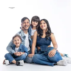 Our studio is the perfect place for a fun, modern family portrait. We had a blast with this adorable family, all styled in denim for a classic yet playful look.