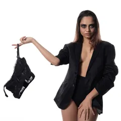 A conceptual fashion shot from my 'Back to Black' series. This image plays with the idea of 'business casual' in a provocative, high-fashion context.