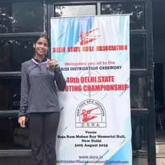 One of my shooters proudly displaying her medal at the 40th Delhi State Shooting Championship prize ceremony.