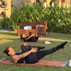 Pilates isn't just movement, it's how you reconnect with yourself. This photo from our outdoor retreat shows a moment of calm and core connection on the mat.