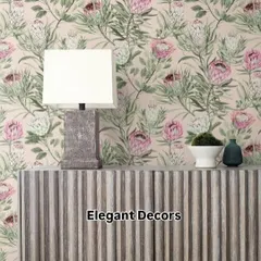 This wallpaper features a subtle protea flower pattern, which pairs beautifully with the fluted console table. It shows how the right wallpaper can complete the look of your furniture and decor.