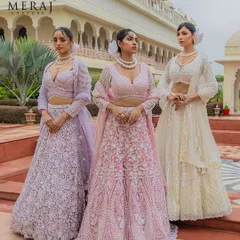 A vision of modern romance in soft pastels. This image showcases a trio of my 'Ruvaah' bridal lehengas in lilac, pink, and ivory, each adorned with intricate 3D florals and fine detailing for a touch of unique elegance.