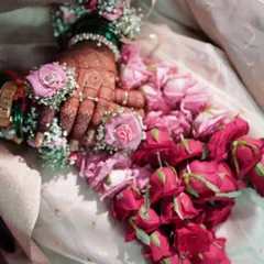 A detailed shot of the rose kalire, showing the intricate weaving of flowers and pearls. Each pair is a work of art.