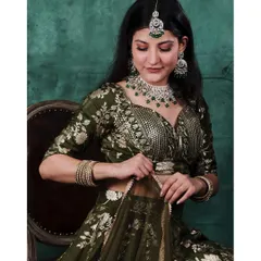A closer, candid-style shot focusing on the details of the blouse and the model's expression. This type of image adds a personal touch to a lookbook, highlighting the fine craftsmanship of the attire and jewellery.