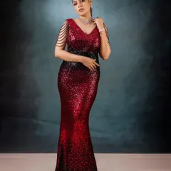 For moments that demand glamour, I designed this red and black ombré sequin gown. The mermaid silhouette is crafted to celebrate your curves, while the draped pearl shoulder details add a touch of modern royalty.