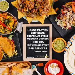 I offer a diverse menu that goes beyond the basics. This platter showcases some of my popular offerings for events, including savory tacos, loaded nachos, fresh wraps, and quesadillas, served with guacamole and sour cream.