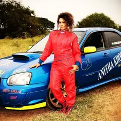 Our founder, Anitha Kholay, with her iconic Subaru rally car. Her passion and experience in professional rallying are the foundation of our motorsport academy.