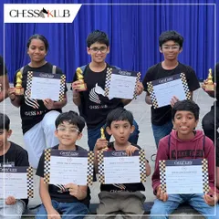 Our talented students proudly display their certificates and trophies after a successful run at the Universal First Age Category Children Chess Tournament.