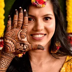 Here is one of my beautiful 'pataka' brides, absolutely radiant and happy during her mehendi ceremony. Seeing this smile is the best part of my job.