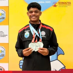 Atharva Janskar showcases the three silver medals he won at the 14th Acrobatic Gymnastics Asian Championships, a remarkable achievement on an international stage.