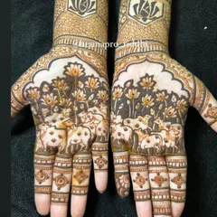 An artistic attempt at traditional Pichwai painting style in henna. This design features holy cows amidst a forest of lotus flowers, creating a unique and spiritual piece of art on the palms.