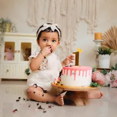 That first taste of birthday cake is a memory worth capturing in all its messy glory. I design beautiful, themed cake smash sessions like this boho-chic setup, complete with a custom cake, so you can just enjoy the moment.
