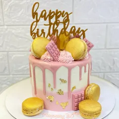 I love creating elegant centerpiece cakes like this one. This pink drip cake with gold leaf accents and handcrafted macarons is perfect for a special birthday. Every detail is made with care to make your celebration unforgettable.