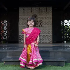 A lovely portrait of a young girl dressed for a cultural event. I make sure to capture the beauty and detail of special occasion outfits.