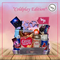 A close-up of the Coldplay hamper, showing the "Yellow Gold Tea" and other themed items that make this gift so special for a fan.