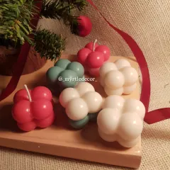 We love how playful these Bubble Candles are. Poured in festive colors like red, green, and white, these soy wax candles add a modern and fun touch to your Christmas decor. They look just as lovely unlit on a shelf as they do when glowing.