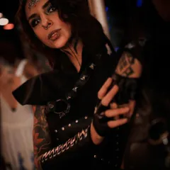 A close-up portrait of our female warrior character. The detailed makeup, costuming, and intense expression help create a believable and compelling performance.