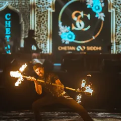 A powerful moment captured during a Sufi-themed wedding. Using a fire dragon staff, I can create dramatic, impactful poses like this that make for incredible photos and memories on your special day.