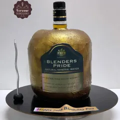 This Blenders Pride bottle cake has a fun secret: there's a real miniature bottle hidden inside for the birthday person to enjoy. The outer shell is a delicious chocolate mousse cake.