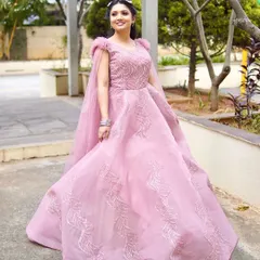 A princess moment in a beautiful pink ball gown. The makeup is soft and glamorous, perfect for an engagement or reception party.