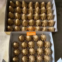 Boxes of Rava Modaks, a popular offering for Ganesh Chaturthi. They have less ghee and a very soft texture.