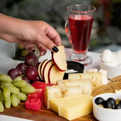 A lifestyle shoot in progress. We often use hand models to add a human element to our photos, making the food or product feel more interactive and relatable.