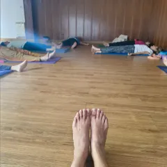 This weekend, move into a deep state of rest. This photo, taken from my perspective in Savasana, shows my students completely relaxed. This simple pose is powerful for recharging the nervous system.