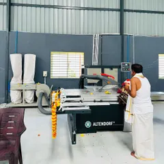 The puja ceremony for our new Altendorf panel saw. This German machine allows us to make precise, clean cuts for perfectly finished modular furniture.