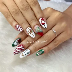 We wish you a merry Christmas with this detailed, hand-painted set featuring reindeer, presents, wine, and candy cane stripes.