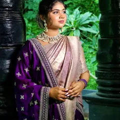 A modern bride with a touch of tradition. I balanced a contemporary soft glam makeup style with this gorgeous purple and gold saree, creating a look that is both timeless and fresh. The focus is on radiant skin and letting her natural beauty shine.