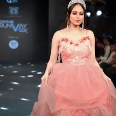 A closer look at the show opener, model Anshika. I styled her in a tiara and long, sparkling earrings to complement the delicate floral details on the neckline of her pink gown for Couture Runway Week.