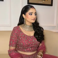 A side profile of this beautiful reception makeup, highlighting the soft smokey eye and flawless base.