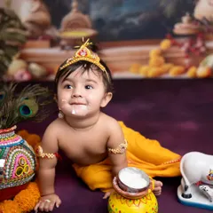 Capturing the playful spirit of little Krishna is always a joy. This Janmashtami theme, complete with a pot of maakhan, is one of the most requested cultural shoots I do.
