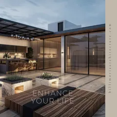 We believe in blurring the lines between inside and out. This open-plan design connects the kitchen and living area directly to an outdoor terrace bar, creating a fluid space for entertainment and daily life.