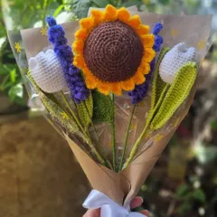Captured in the sunlight, this bouquet shows how vibrant our crochet flowers are. It's a wonderful, long-lasting alternative to fresh flowers for any celebration.