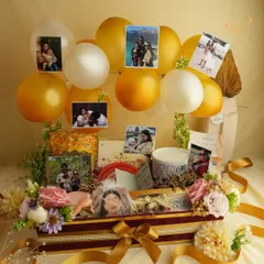 This is what personalization looks like. I created this special hamper featuring a collage of cherished photo memories, balloons, and handpicked treats to celebrate a unique bond. It’s more than a gift; it’s a treasure box of their favorite moments.