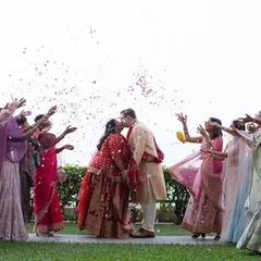 Another angle of the flower shower, capturing the joy and union of two cultures in a single, happy frame.