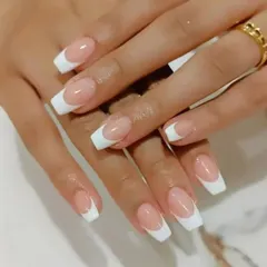 A clean and classic square-tipped French manicure. This is a go-to style for a professional and polished look that never fails.