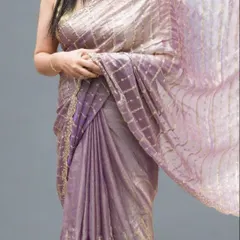 A mid-drape shot of the lavender organza tissue saree, showing how beautifully the fabric falls and catches the light.
