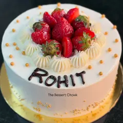 A classic strawberry fresh cream cake. The light vanilla sponge is layered with fresh cream and topped with sweet, juicy strawberries.