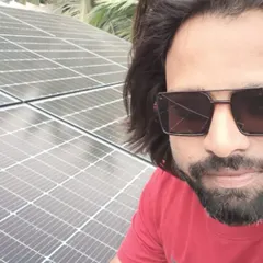 A proud customer with his new on-grid solar system in Dharwad, Karnataka. He is now generating his own electricity and significantly cutting down his monthly expenses.