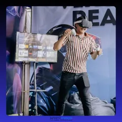 Step into another reality with my VR gaming setup. Here, a player is fully immersed in a virtual world, while the action is shown on a spectator screen so everyone can be part of the fun.