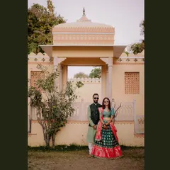 A beautiful couple portrait from a Mehendi ceremony at the stunning Amar Mahal in Orchha. The heritage architecture provides a perfect royal backdrop for this destination wedding event.