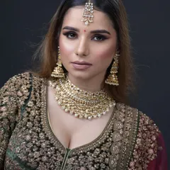 A closer look at the flawless base and striking eye makeup. Our students learn to work with different lighting conditions to ensure the bride looks perfect both in person and on camera.