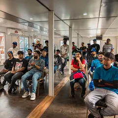 A full house for the rider briefing. We make sure everyone, from first-timers to seasoned riders, is on the same page about track etiquette and safety before we head out.