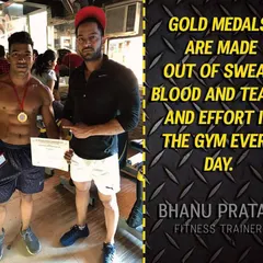Gold medals are earned with sweat and effort in the gym, every single day. Here I am with my client, celebrating a well-deserved win that was built on pure hard work and determination.