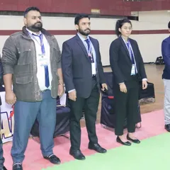 Our technical officials and leadership team are pictured here at a national event. We emphasize professionalism and adherence to the highest standards in all our organized competitions and training programs.